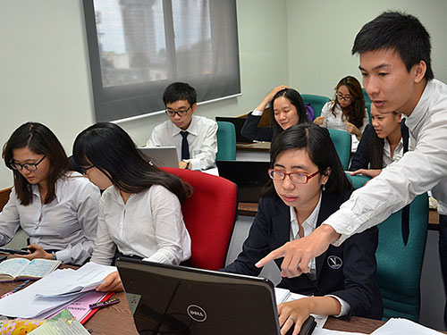 Tranh chấp tại Trường ĐH Hoa Sen là một trong những điểm nóng của giáo dục ĐH năm 2014. Trong ảnh: Sinh viên Trường ĐH Hoa Sen trong giờ học Ảnh: Tấn Thạnh