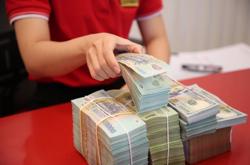 Lộ diện những ngân hàng đầu tiên công bố lợi nhuận cao đột biến