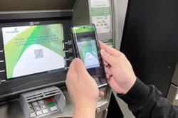 Nhận lương hưu, trợ cấp qua ATM có phải đóng thuế?