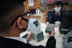 Room tín dụng, nới hay bó cứng?