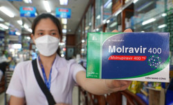 Đã uống Molnupiravir, có cần đeo khẩu trang?