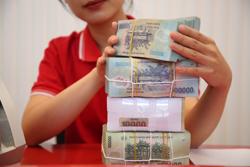 Lượng tiền gửi từ người dân vào hệ thống ngân hàng đạt kỷ lục trong năm