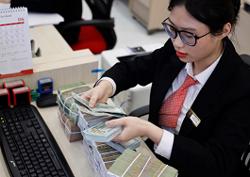 Doanh nghiệp đau đầu vì tỉ giá