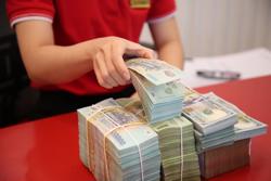 Vay tiền phải mua bảo hiểm, Ngân hàng Nhà nước nói gì?