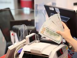 Thở phào với tỉ giá