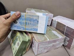 Khó đổi tiền lẻ mới lì xì Tết