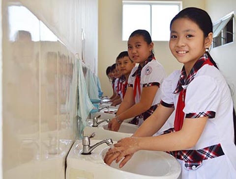 Rửa tay bằng xà phòng là một trong những biện pháp giúp trẻ phòng bệnh tả. Ảnh: TL